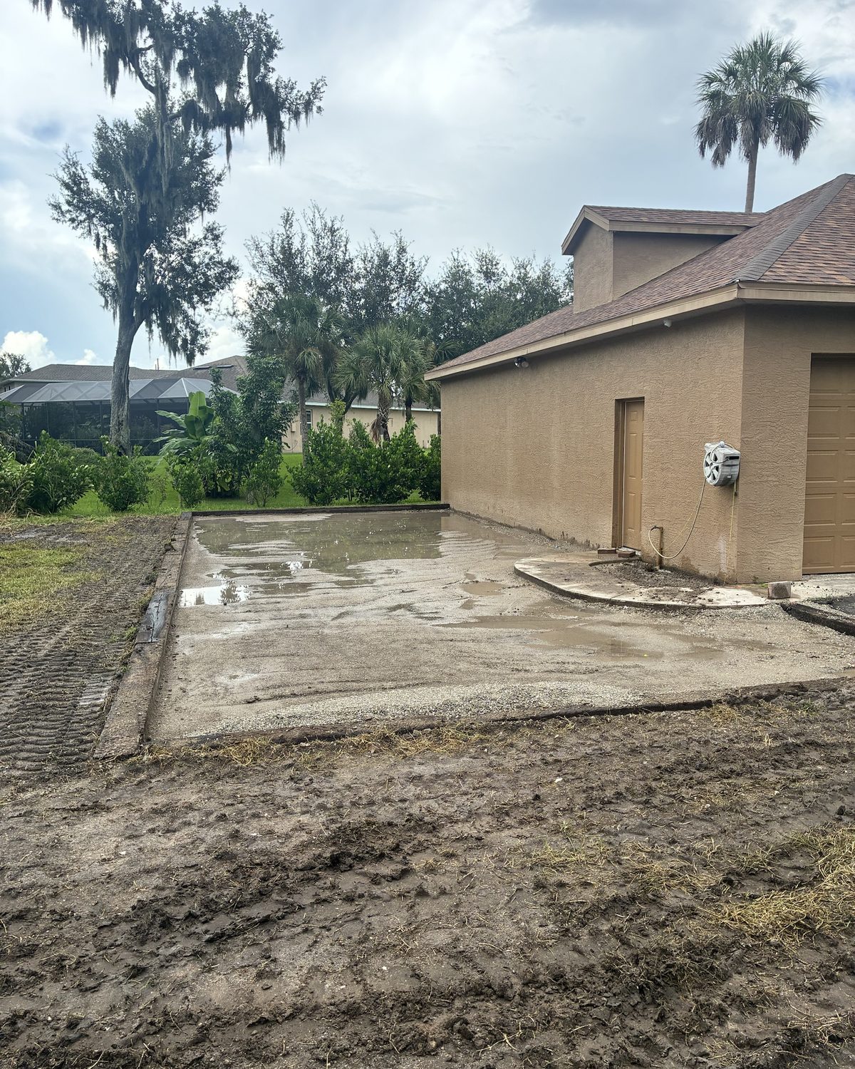 Graded and compacted base pad prepared before footing is laid