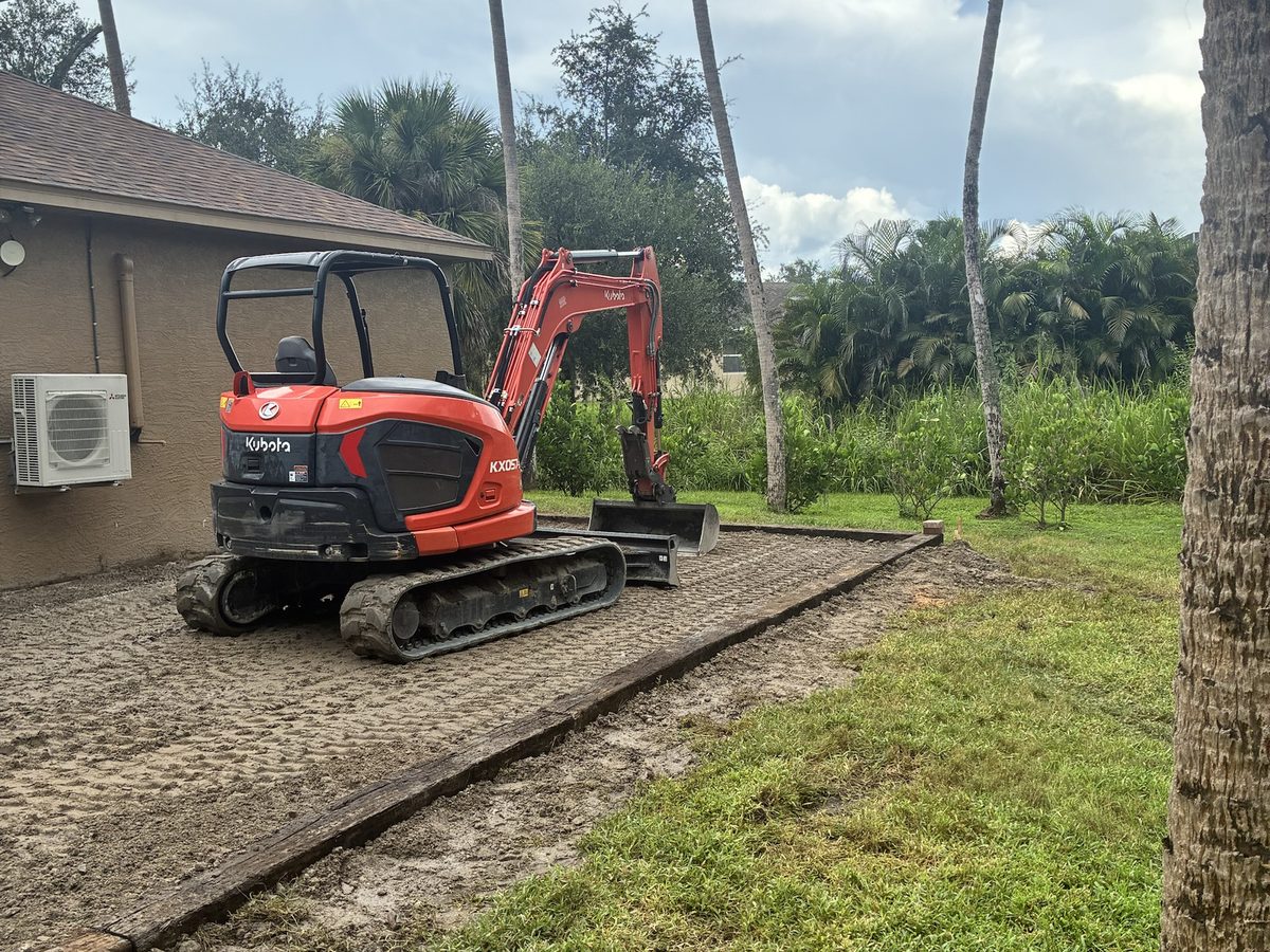 Compacted and graded base pad ready for arena footing