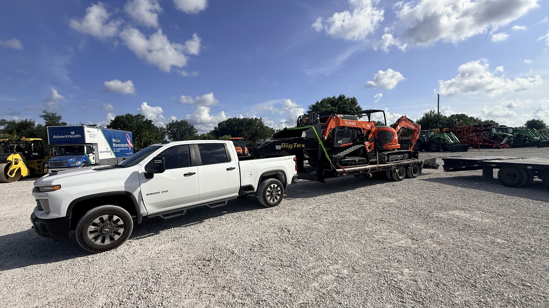 Luc with the Eco Site Works Kubota SVL 75-3 track loader and KX057-5 mini excavator