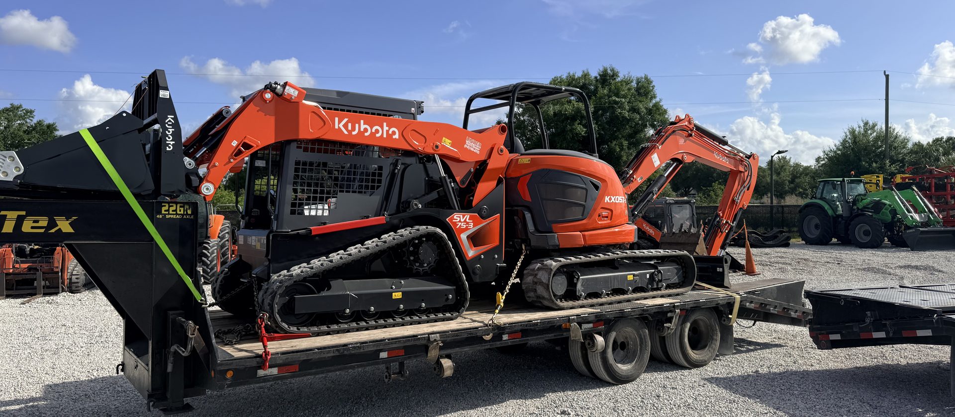 Eco Site Works rig — both Kubotas loaded on the BigTex gooseneck trailer, ready to deploy